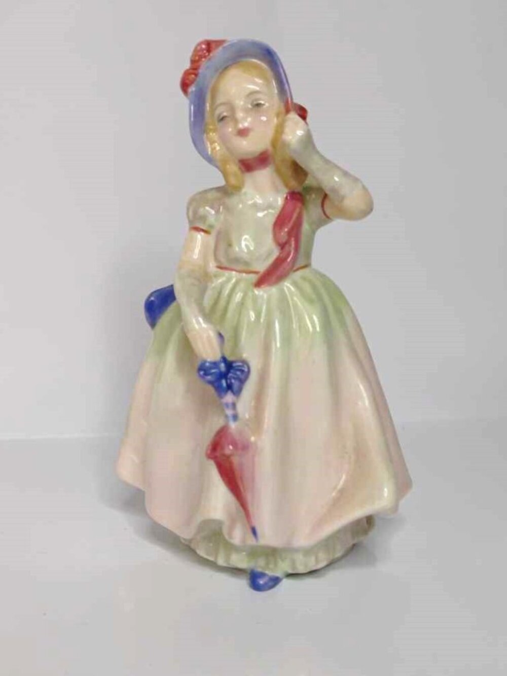 Vintage Royal Dalton Porcelain Figurine Babie Girl with umbrella